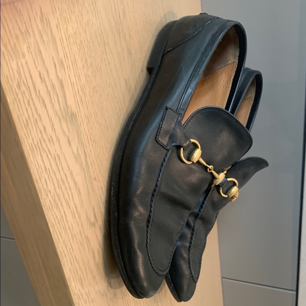 Gucci Black Boat Shoes with Gold Hardware and Soft Material